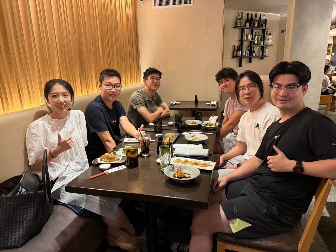 Chuchu Chen with members of EPIC Lab at a group dinner.